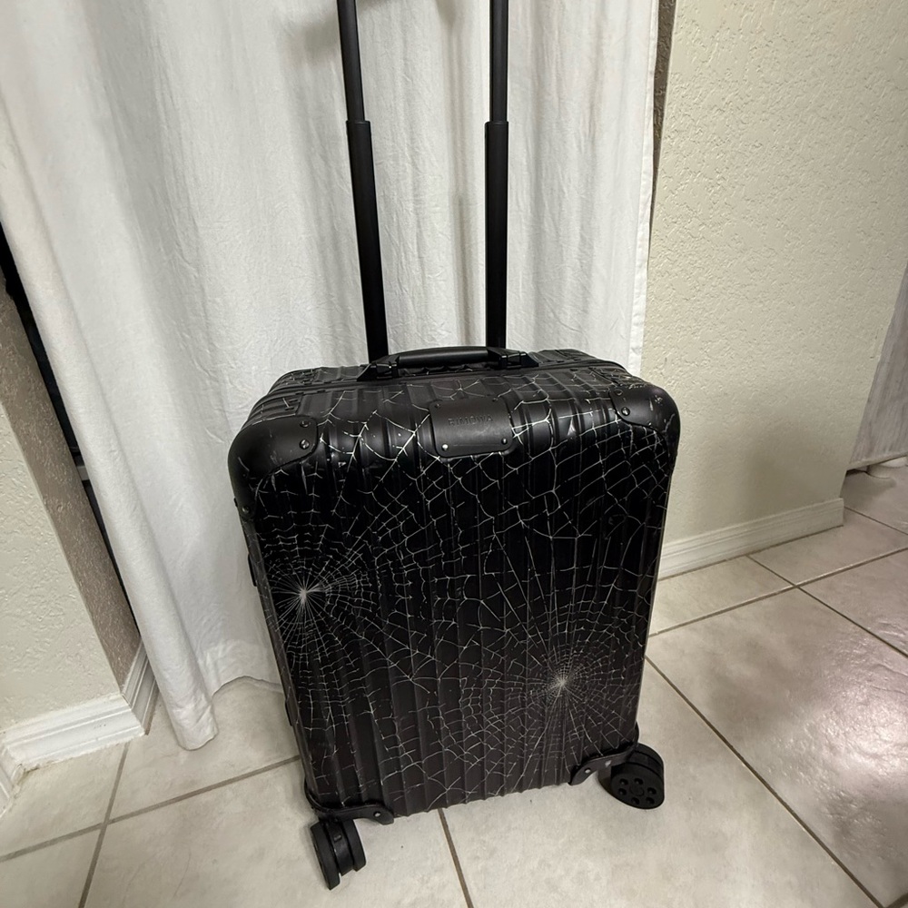 RIMOWA Black Spider Web Rolling Suitcase
